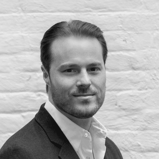 Black and white portrait of founding partner Dave Walsh